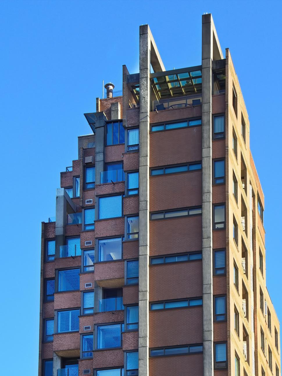 Free Image of Modern high-rise with unique architectural design 