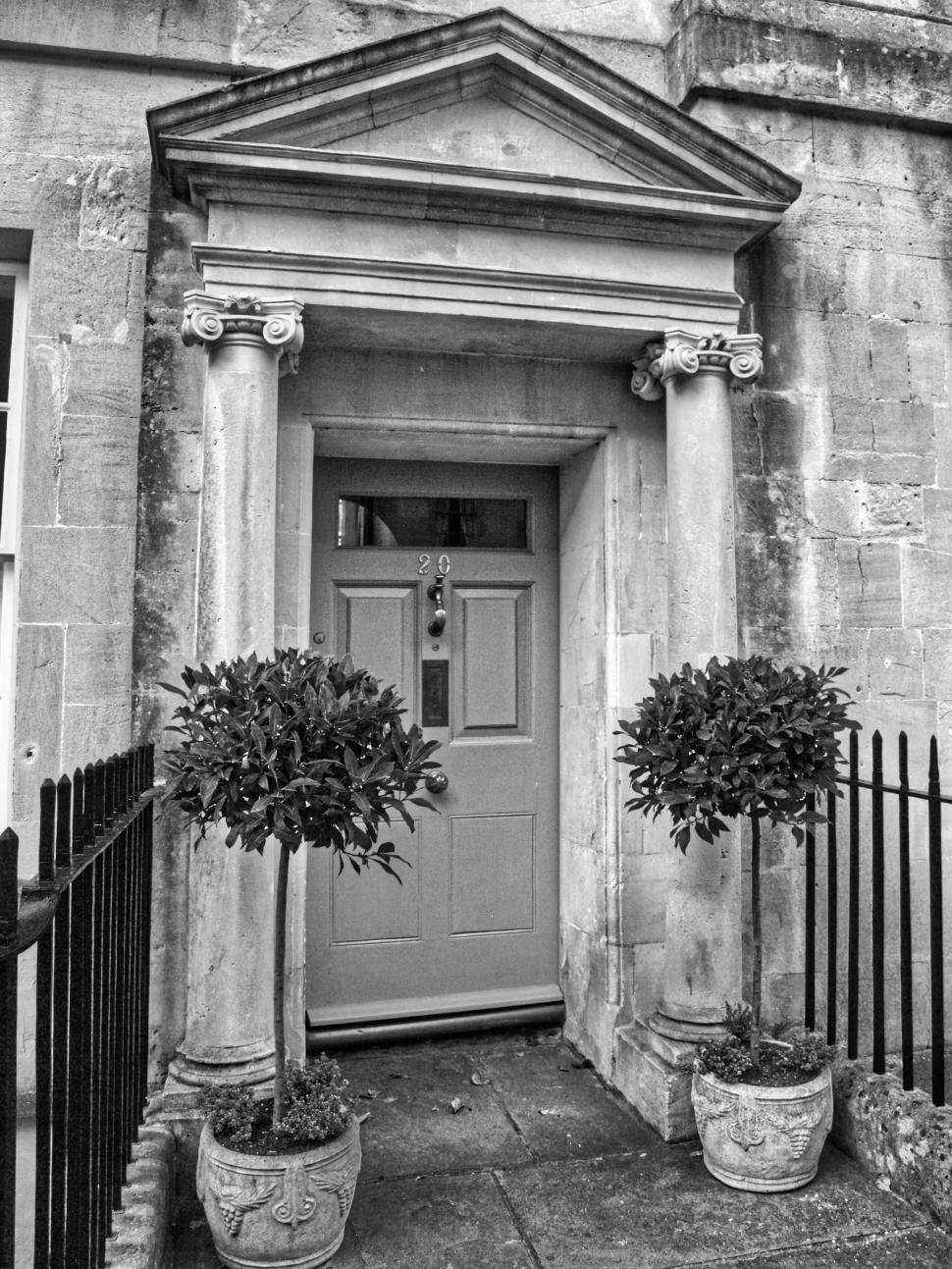 Free Image of Vintage stone doorway with classical architectural elements 