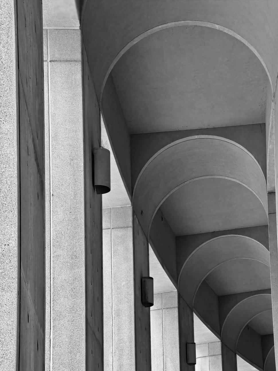 Free Image of Monochrome architectural arches in symmetrical sequence 