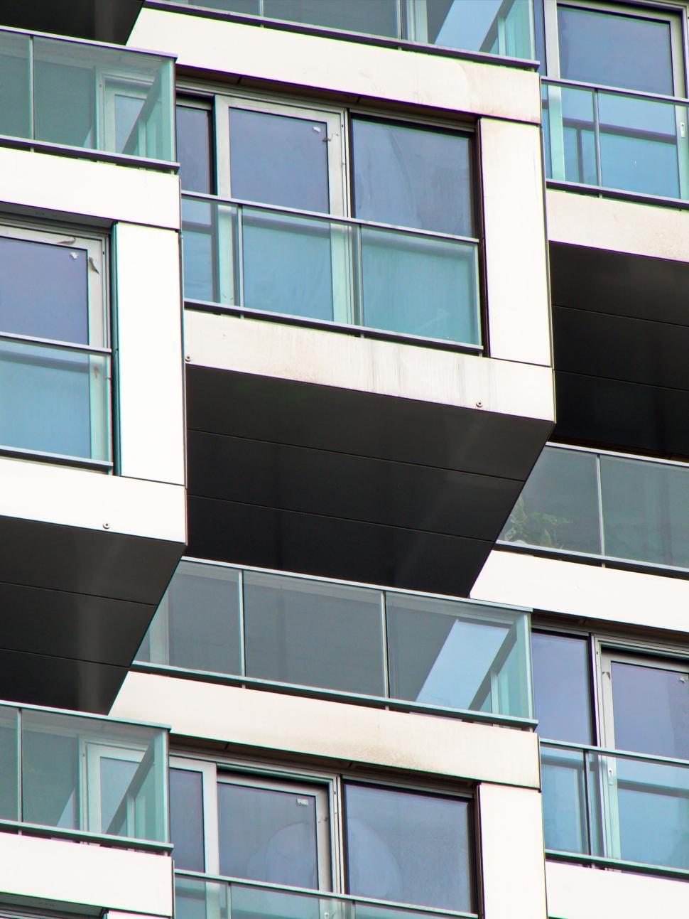 Free Image of Abstract view of modern building with glass balconies 