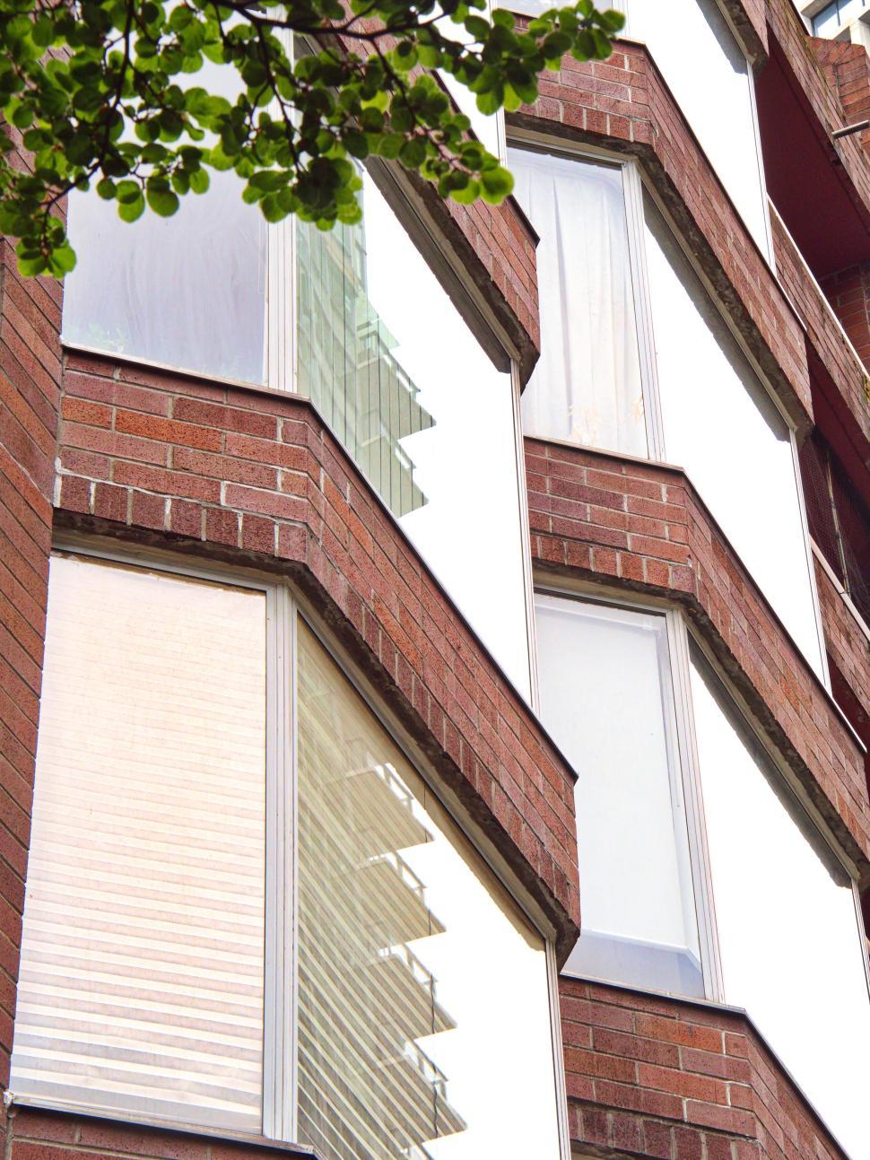Free Stock Photo of Brick façade residential building with angled bay ...
