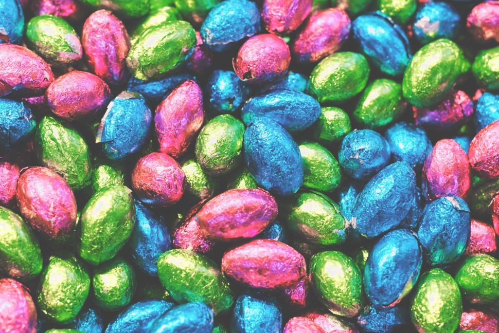 Free Image of Colorful foil-wrapped chocolate eggs in close-up view 