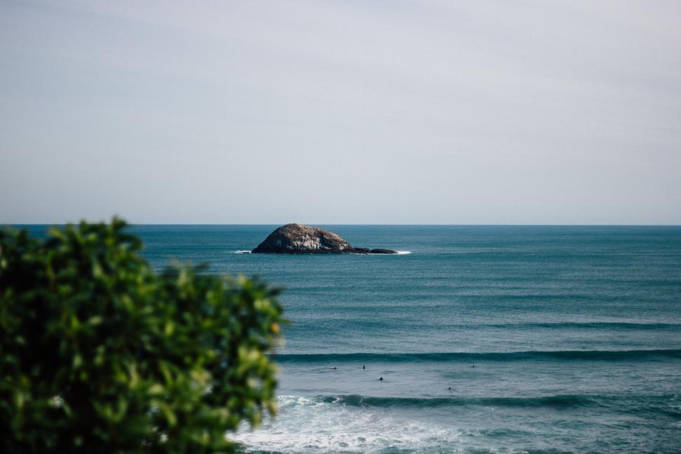 Free Image of Solitary rock island in the middle of the vast ocean 