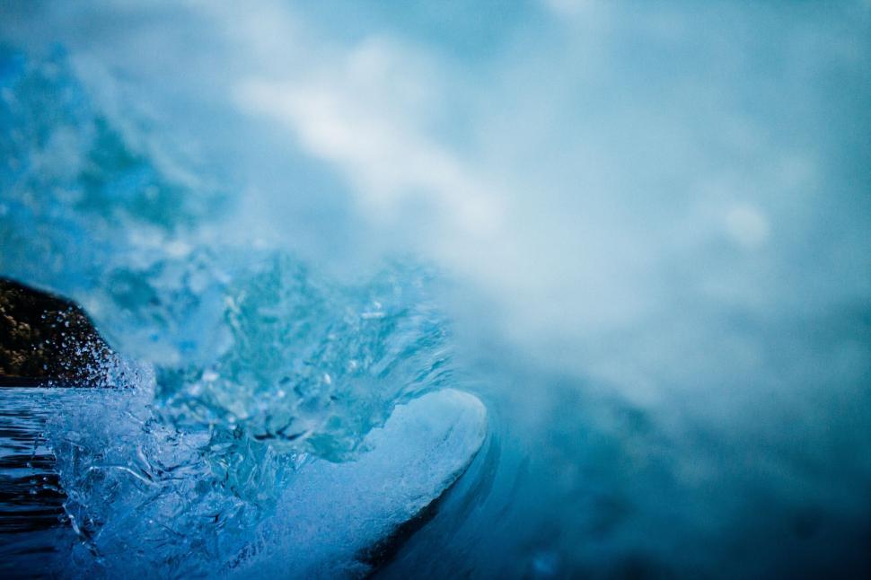 Free Image of Close-up of ocean wave with deep blue colors 