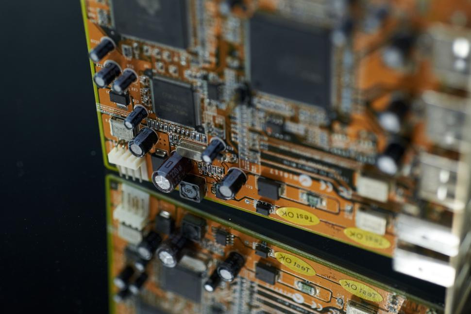 Free Image of Close-up of a circuit board with intricate electronic components 