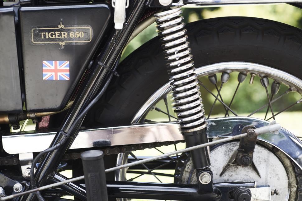 Free Image of Partial view of vintage motorcycle with British flag 
