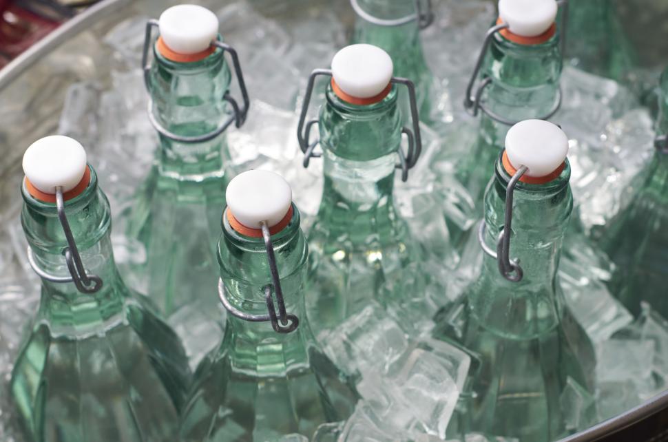 Free Stock Photo of Green glass bottles chilling in ice water ...