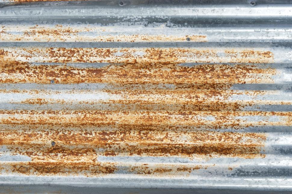Free Image of Rusty corrugated metal sheet background texture 