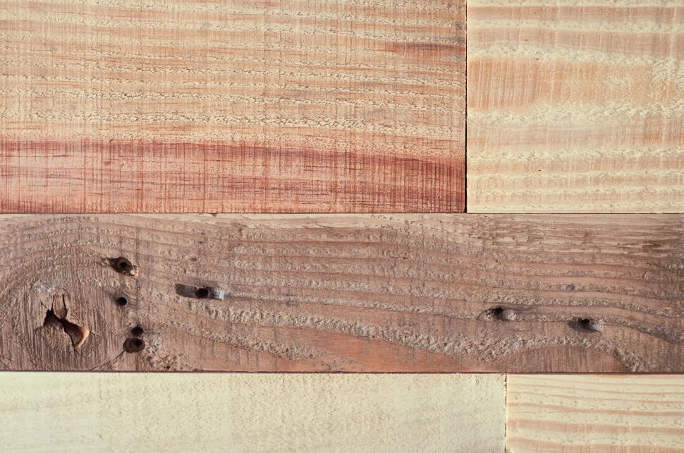 Free Image of Close-up of textured wooden planks in various shades 