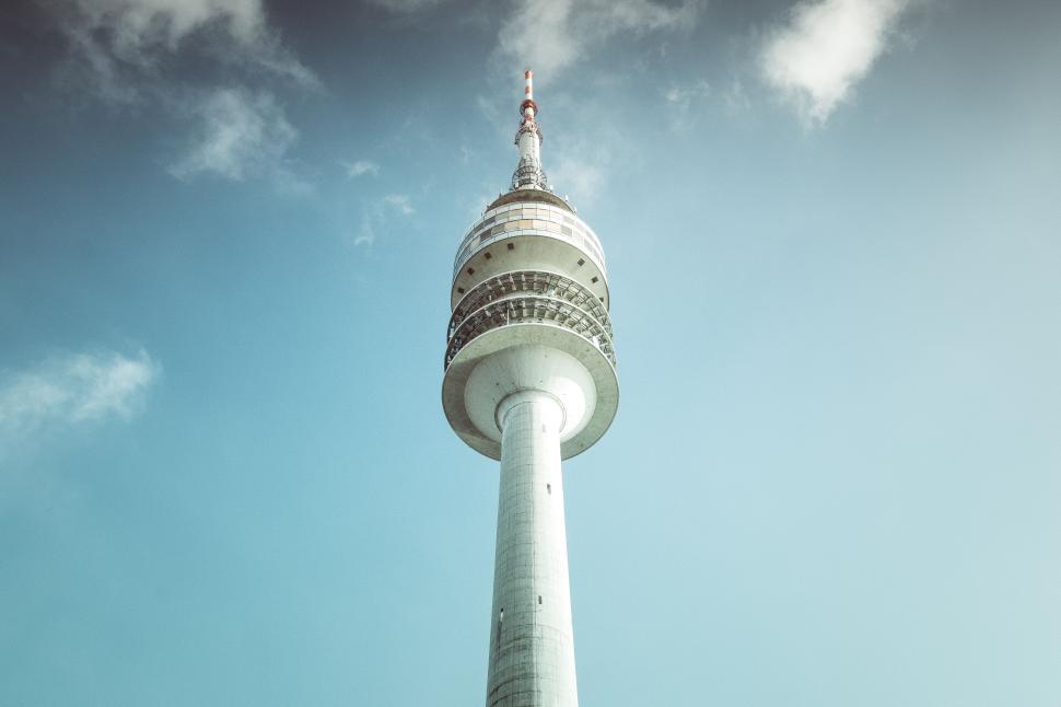 Free Image of Futuristic tower against a clear, blue sky background 