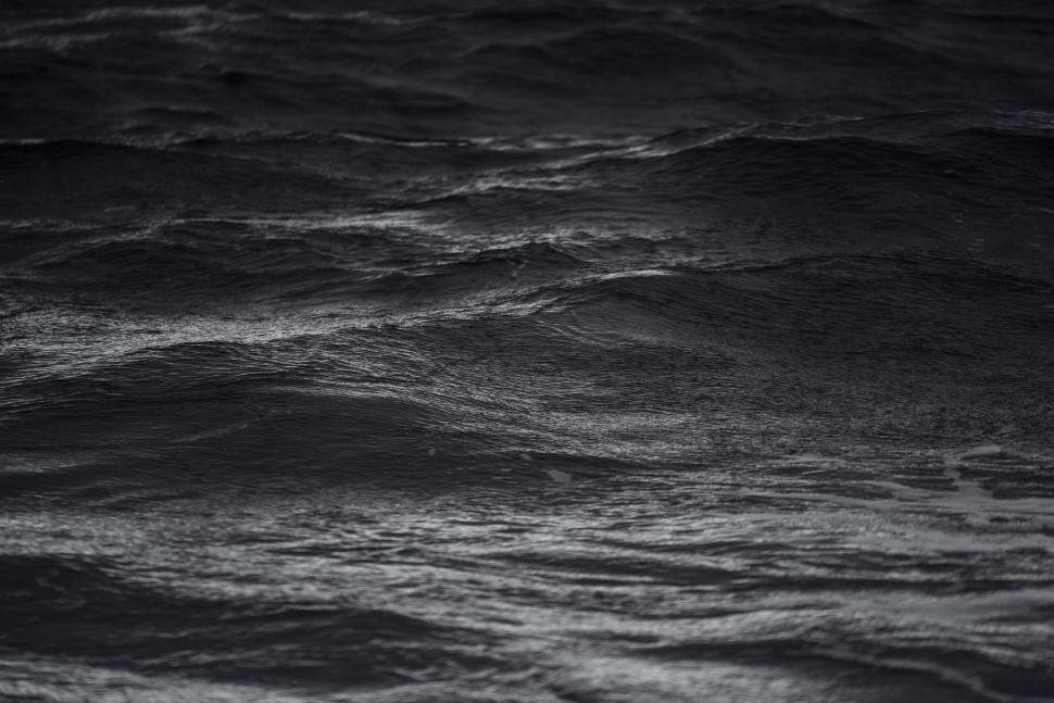 Free Image of Dark ocean waves captured during a tranquil evening 