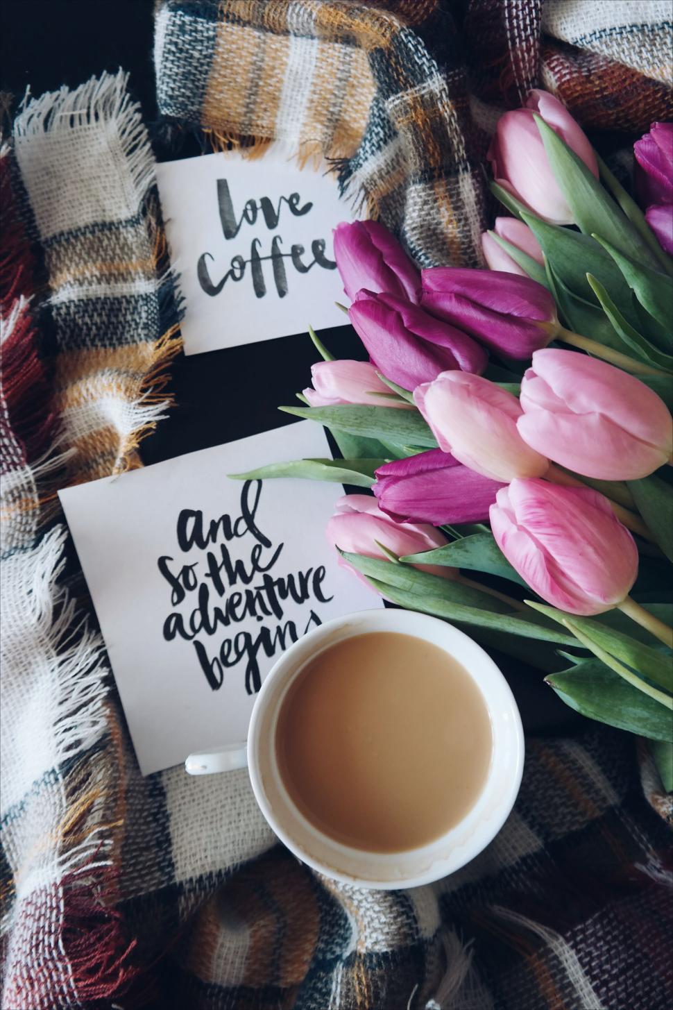 Free Image of Pink tulips and coffee with love and adventure notes 