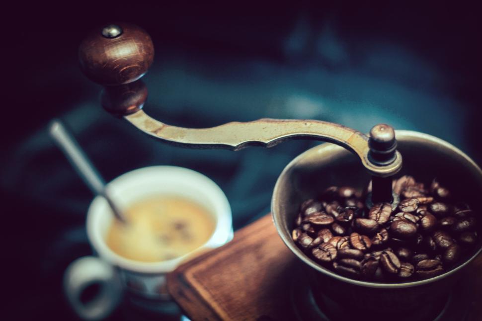 Free Image of Close-up of coffee grinder and cup of fresh espresso. 