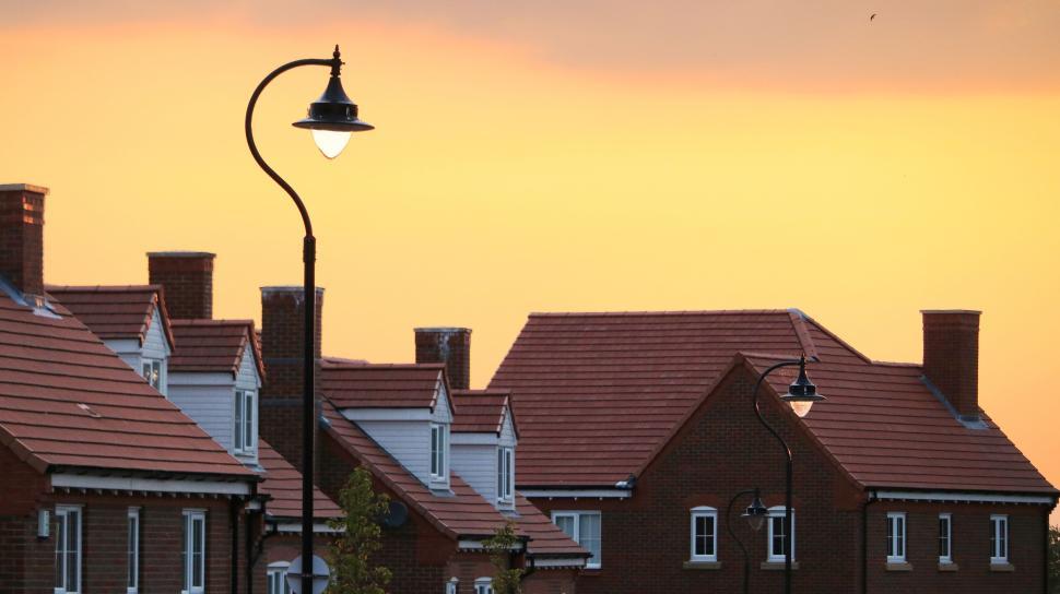 Free Image of Suburban neighborhood with houses at sunset. 