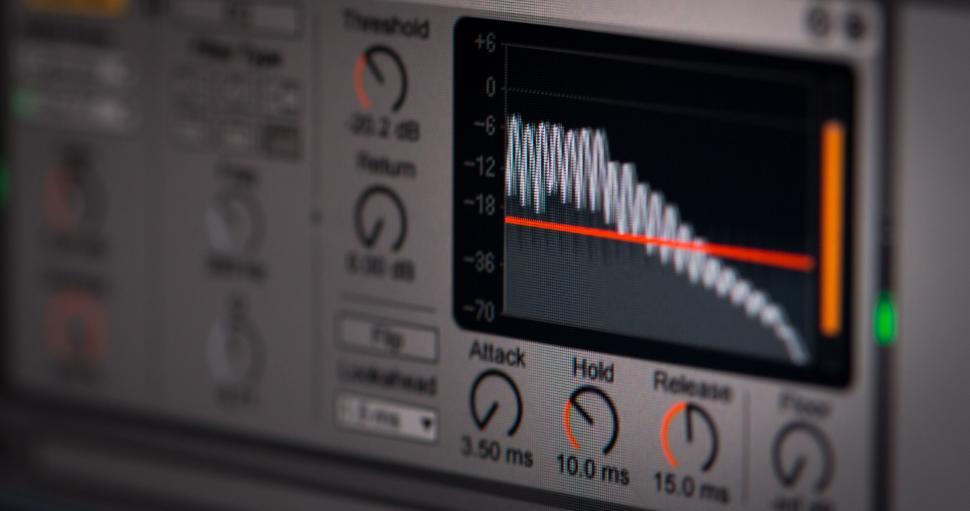 Free Image of Close-up of an audio mixer with detailed controls and display 