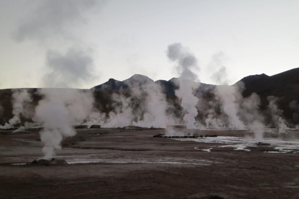 Free Image of Steam rising in early morning from natural geothermal field 