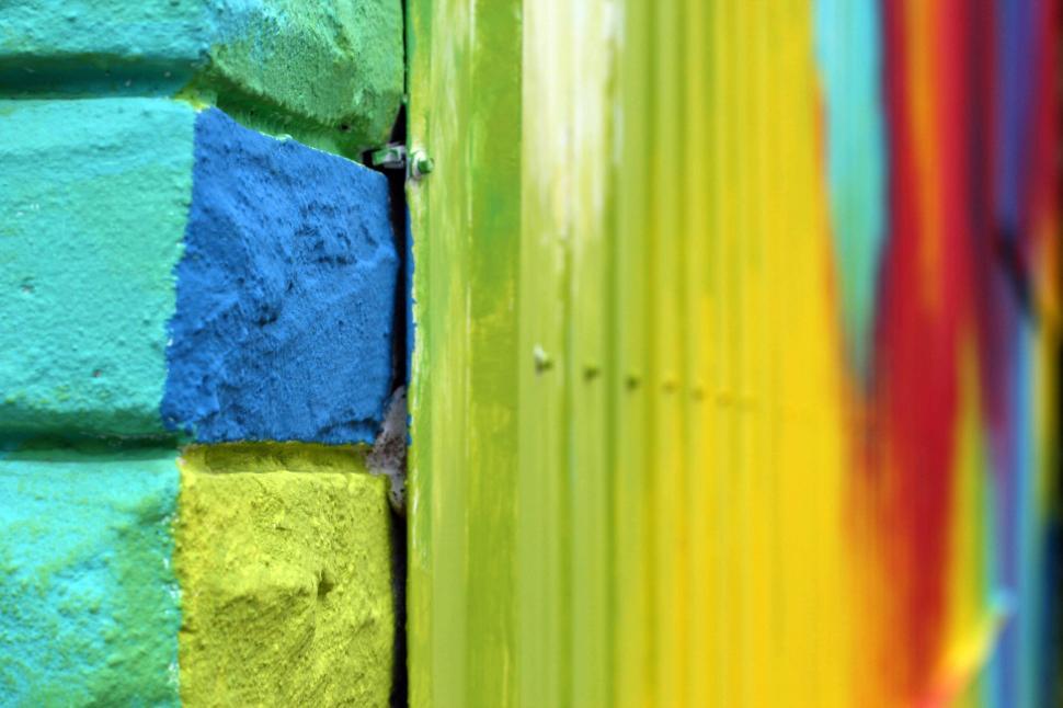 Free Image of Brightly colored wall with blue, green and yellow paint 