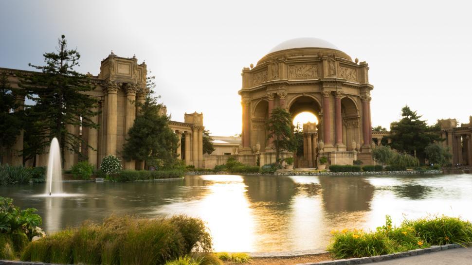 Free Image of Dome pavilion with fountain by the lake at sunset. 