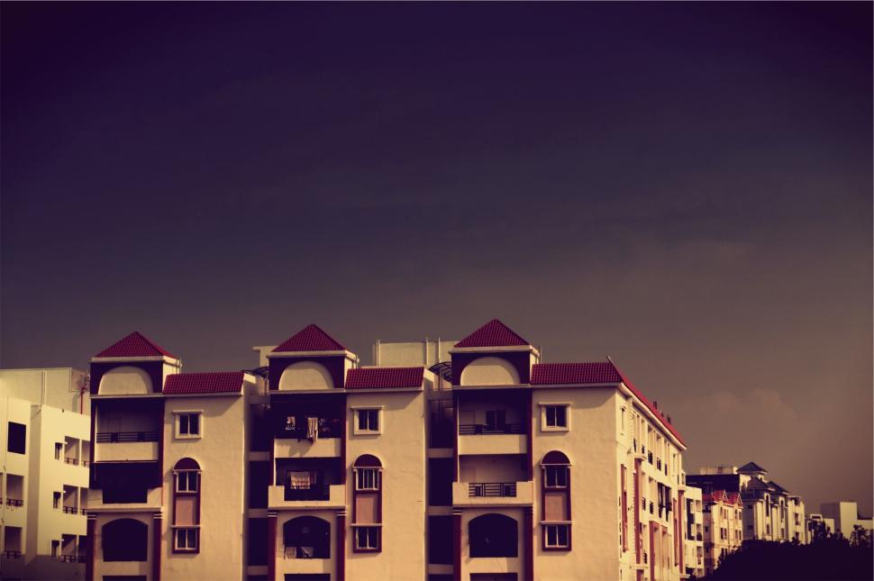 Free Image of Modern apartment buildings under a beautifully dark sky 