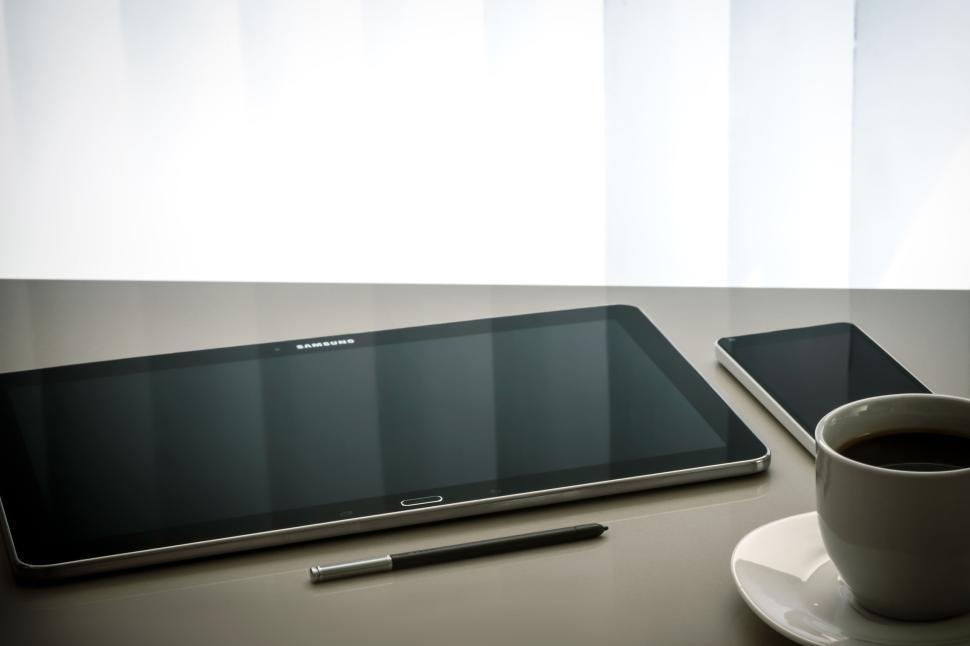 Free Image of Modern workspace with tablet, smartphone, and coffee 