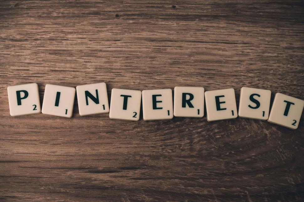 Free Image of Scrabble tiles spelling  PINTEREST  on wooden surface. 