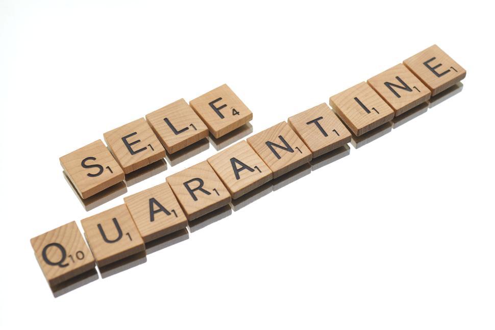Free Image of Scrabble pieces spelling out  Self Quarantine 