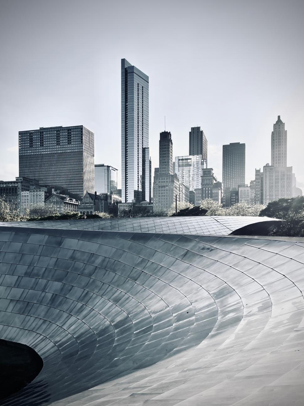 Free Image of View of Chicago skyline with sleek buildings from BP Pedestrian Bridge 