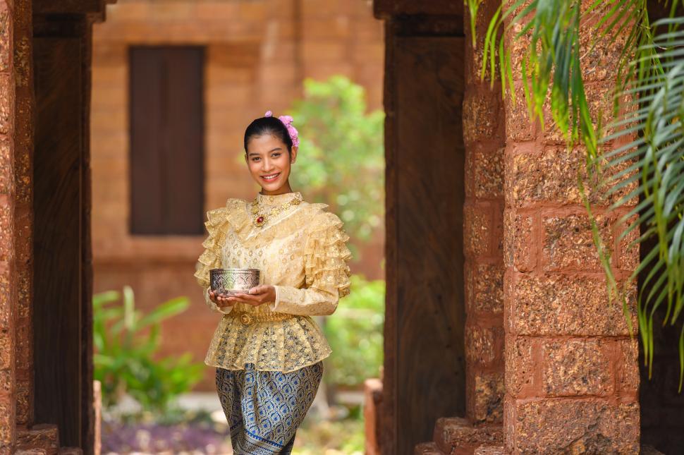 Free Image of Portrait beautiful woman in Songkran festival with Thai Traditional costume 
