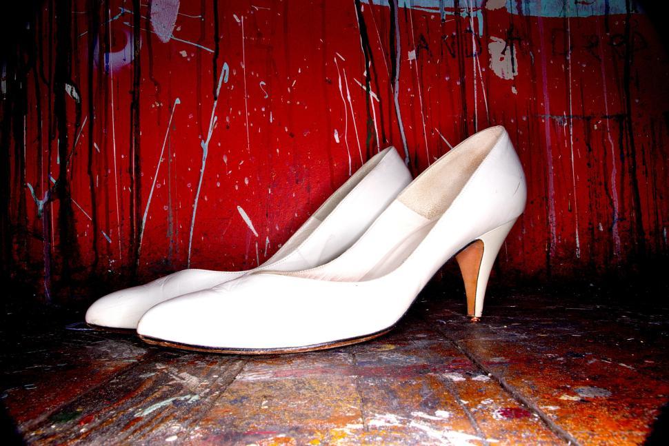 Free Image of Elegant white high heels on a colorful background 