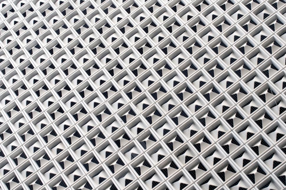 Free Image of Intricate geometric pattern of white mesh grid from architecture 