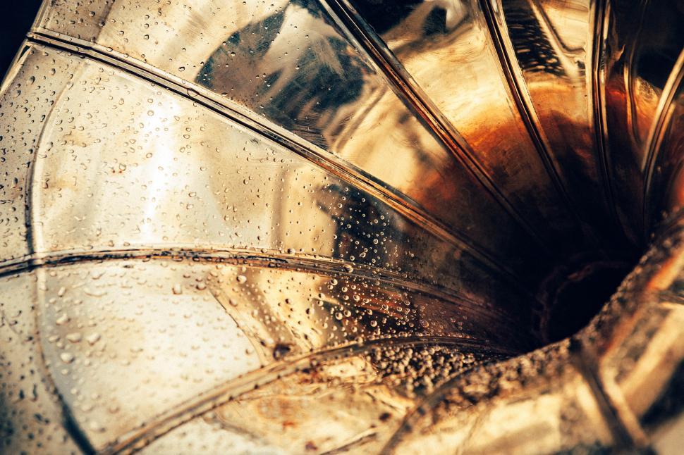 Free Image of Vintage gramophone with droplets reflecting light in sunlight 