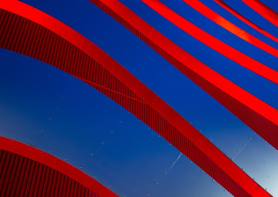 Free Image of Vibrant red and blue architectural lines create striking visual impact 