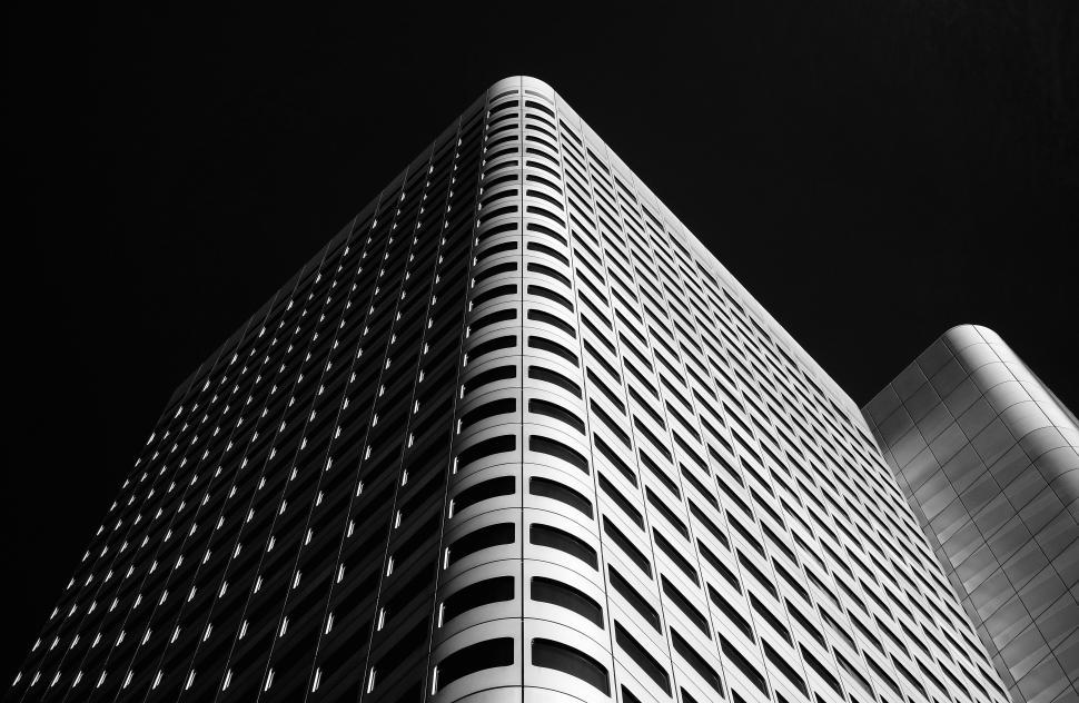 Free Image of Modern architectural structure showcases unique design against contrasting backdrop 