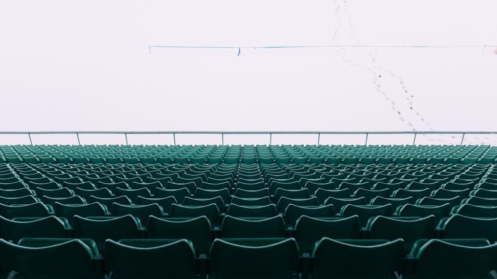 Free Image of Empty stadium seats create a tranquil atmosphere 