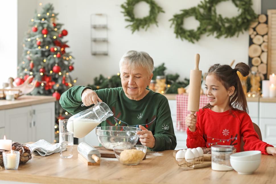 Free Image of Baking holiday treats with family in cozy kitchen 