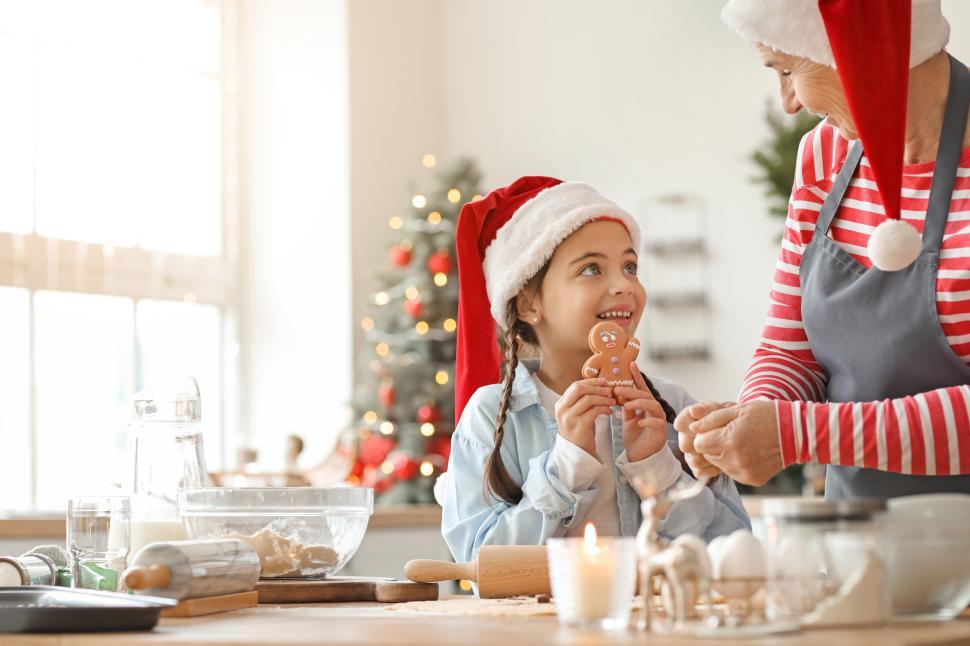 Free Image of Christmas baking fun with family in the kitchen 