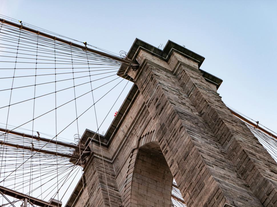 Free Image of Brooklyn Bridge showcasing intricate architecture at dusk in New York City 