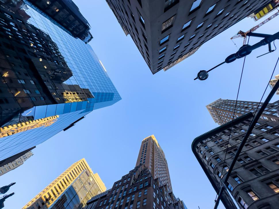 Free Image of Urban skyline view capturing buildings against a clear blue sky 