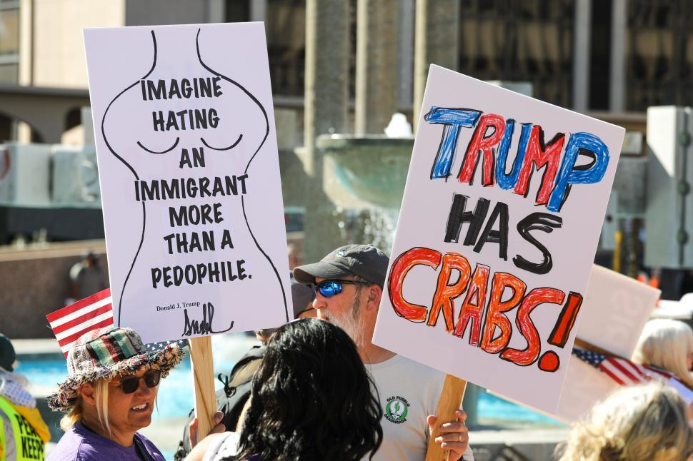 Free Image of Protesters gather in city square against immigration policies 