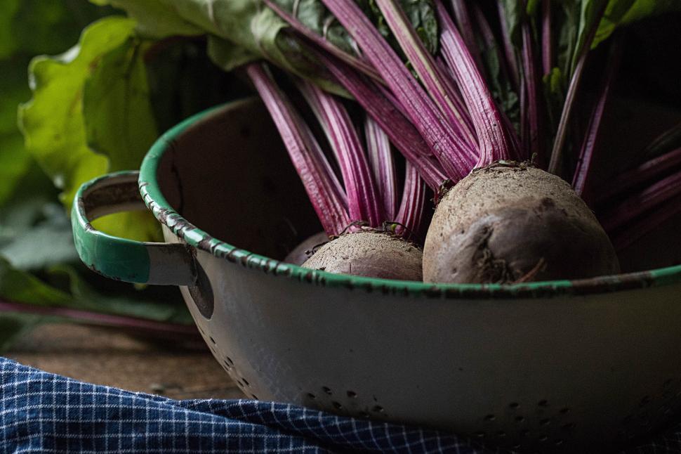 Free Image of Freshly harvested beets in a rustic colander 