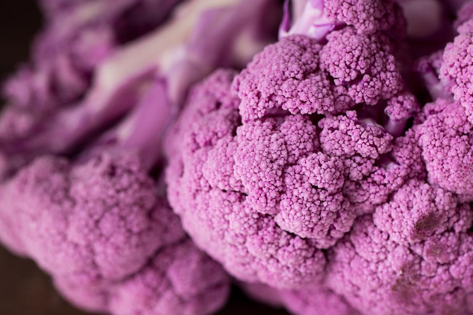 Free Image of Vibrant purple cauliflower in fresh display at market 