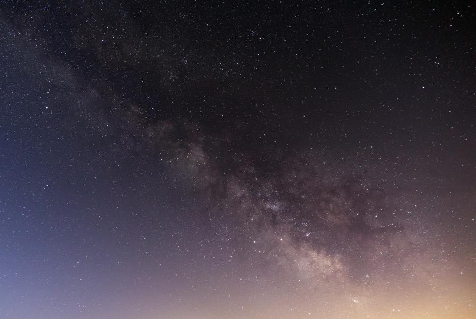 Free Image of Starlit sky over tranquil landscape at night 
