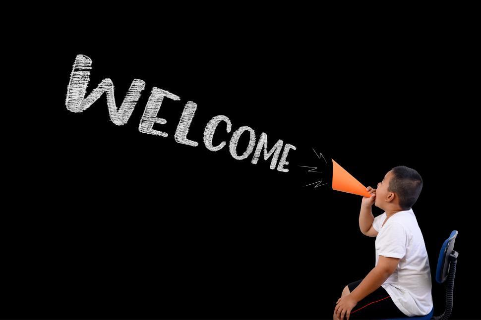 Free Image of The boy shouted loudly Welcome 