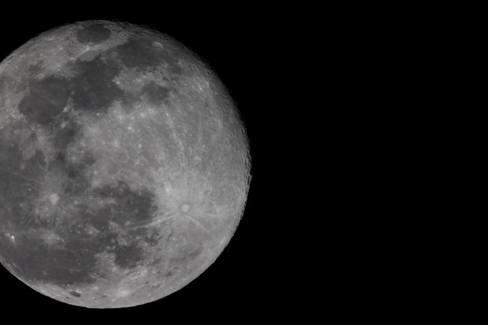 Free Image of Full moon shining brightly in a night sky 