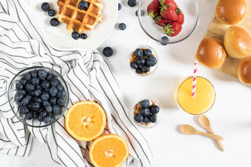Free Image of Delicious breakfast spread with fruits and waffles 