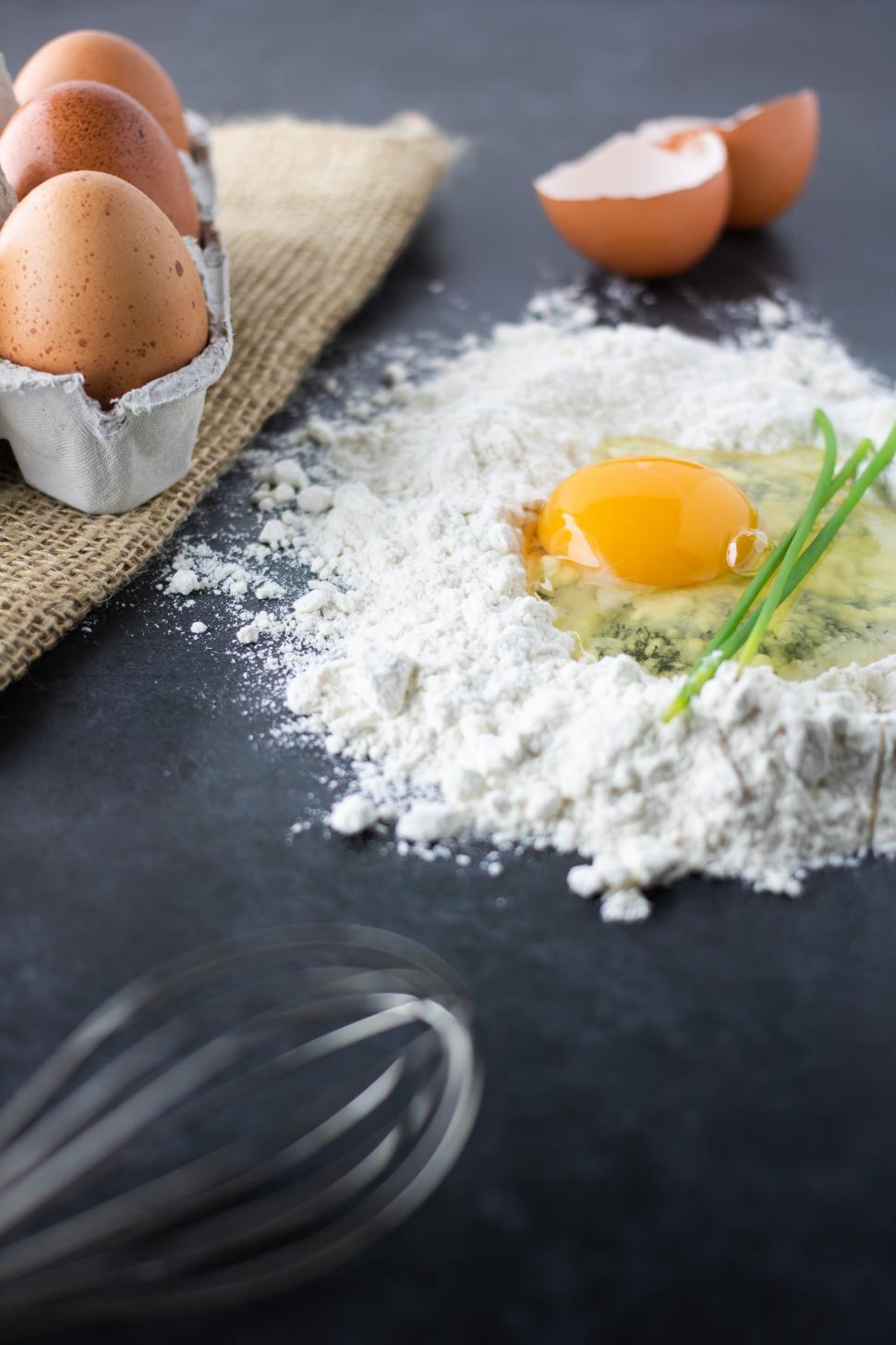 Free Image of Mixing fresh ingredients for homemade pasta dough 