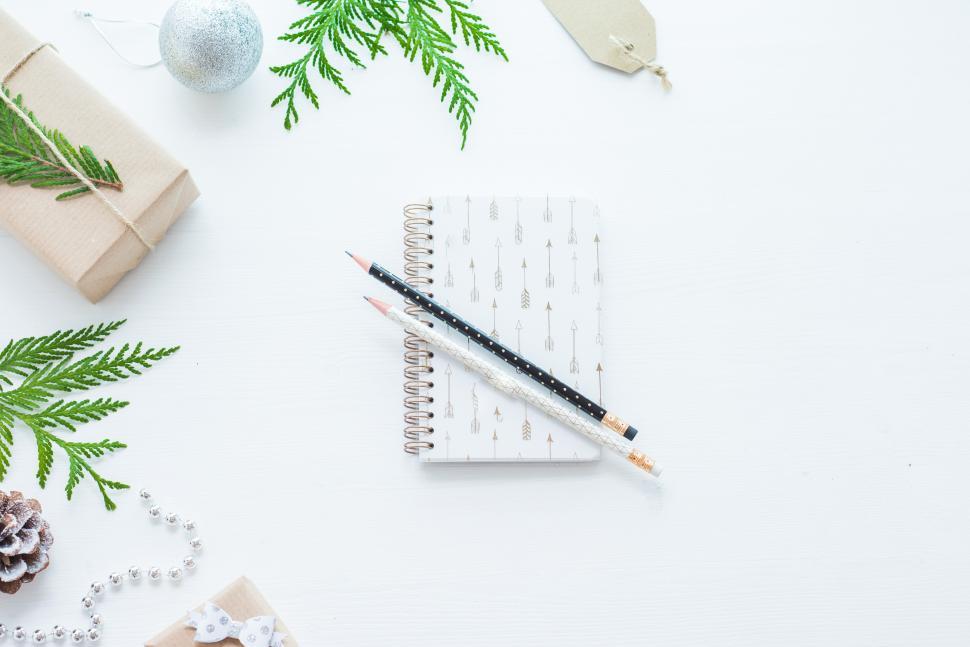 Free Image of Creative workspace featuring festive decorations and tools 