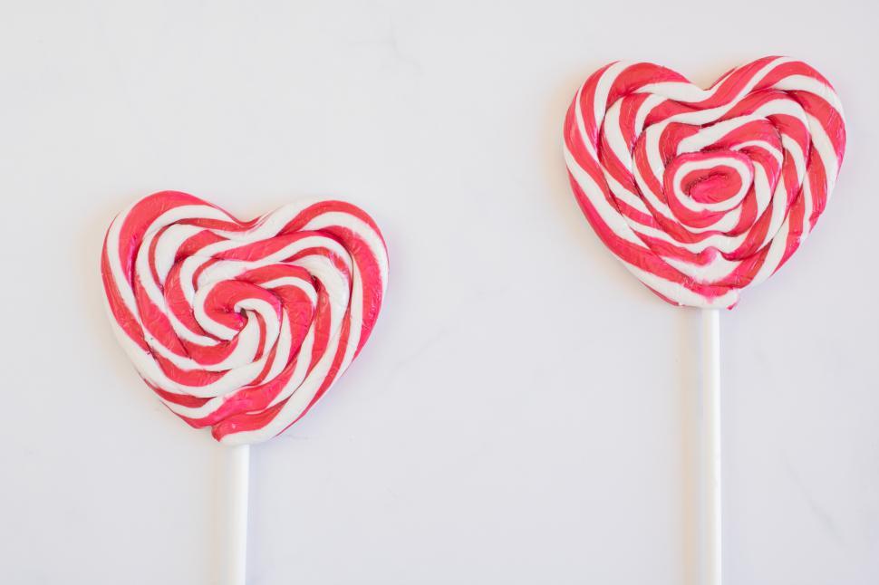 Free Image of Colorful heart-shaped candies on white background 