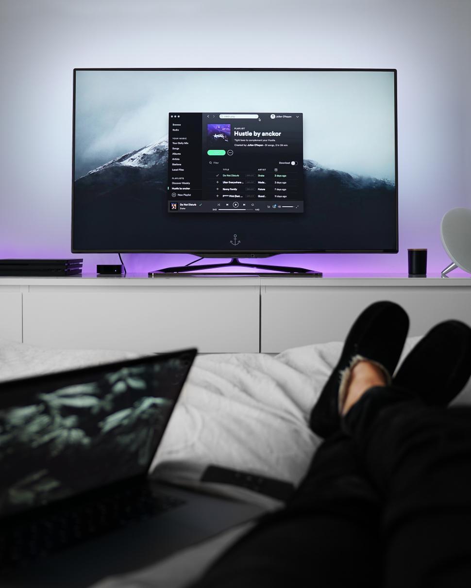Free Image of Relaxation time with music streaming on a modern television 