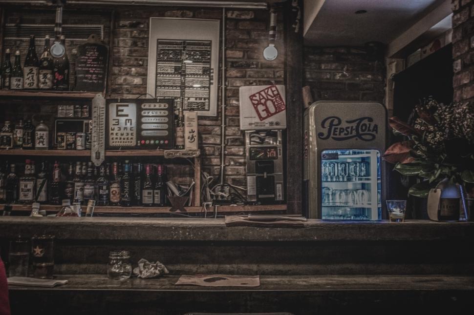 Free Image of Unique bar interior with vintage decor and drinks 